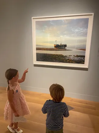 Membership page photo kids in Joel Sternfeld exhibition
